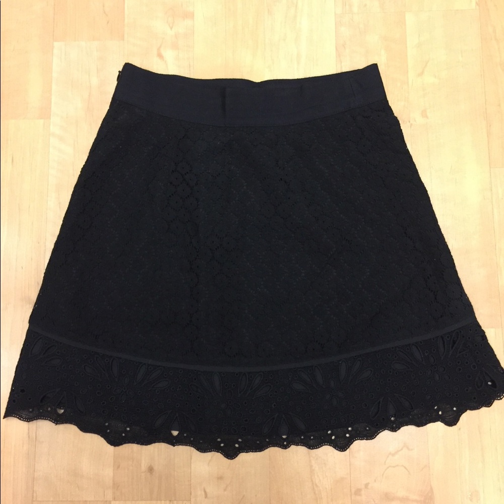 Black skirt with lace-like overlay